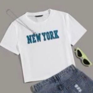 white crop top with graphic letters